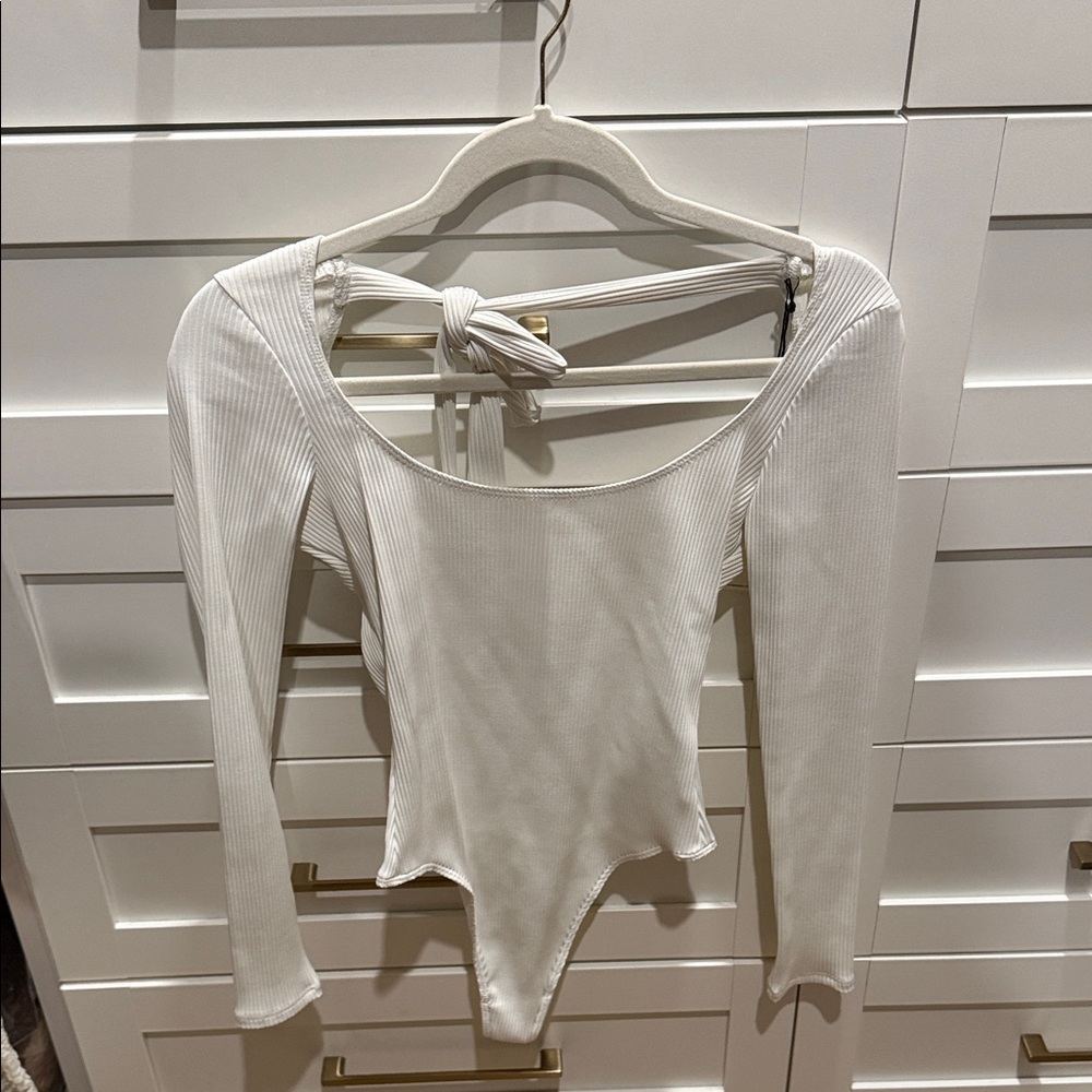 Elegant White Ribbed Bodysuit